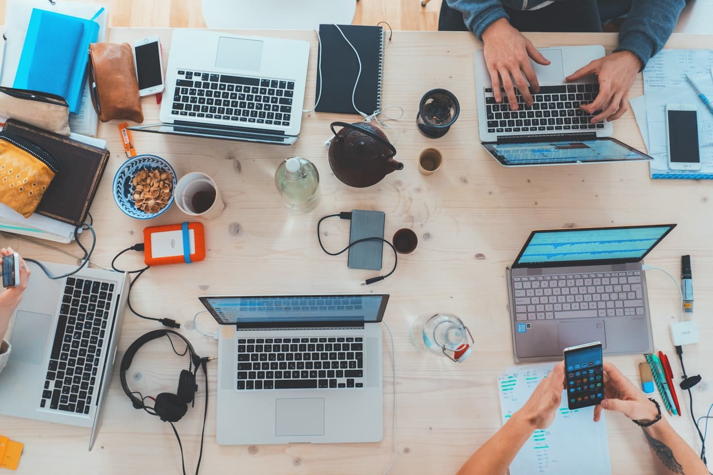 Modern office workspace with laptop showing SEO analytics and digital icons representing AI, automation, and workflow integration for small business efficiency